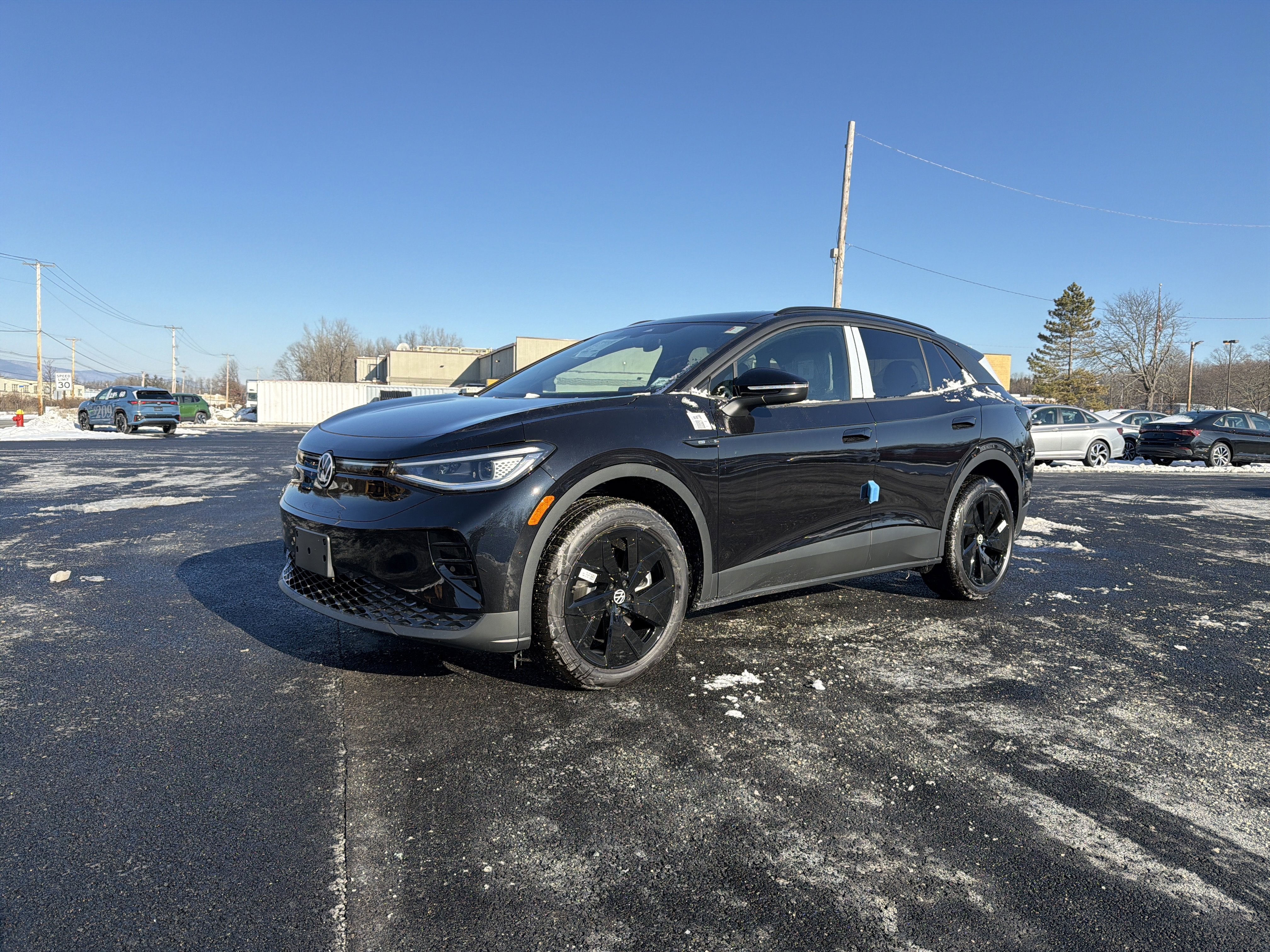 2025 Volkswagen ID.4 Pro S in Deep Black Pearl — front three-quarter view