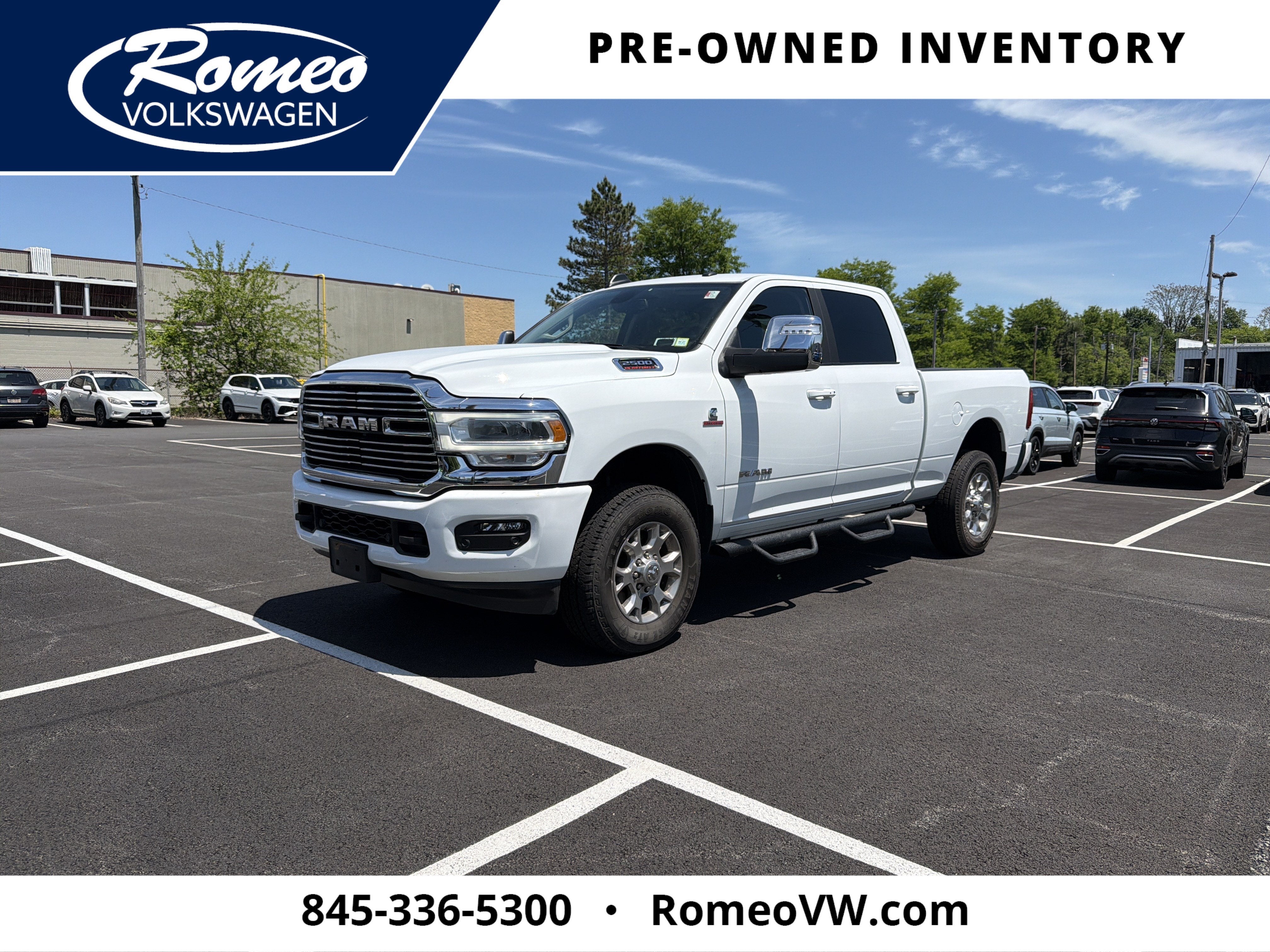 2024 RAM 2500 Laramie in Bright White Clearcoat — front three-quarter view
