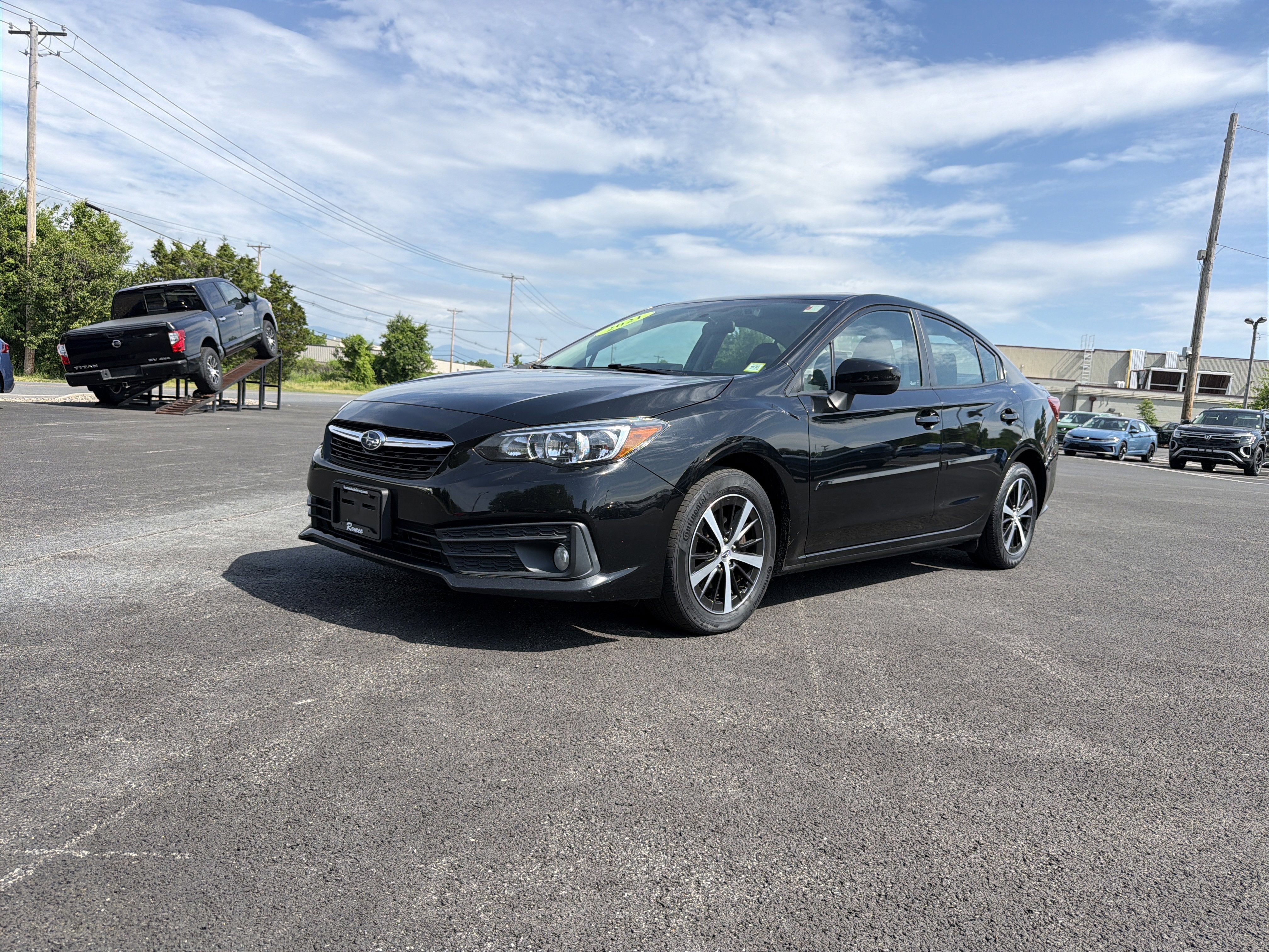 2021 Subaru Impreza Premium in Crystal Black Silica — front three-quarter view