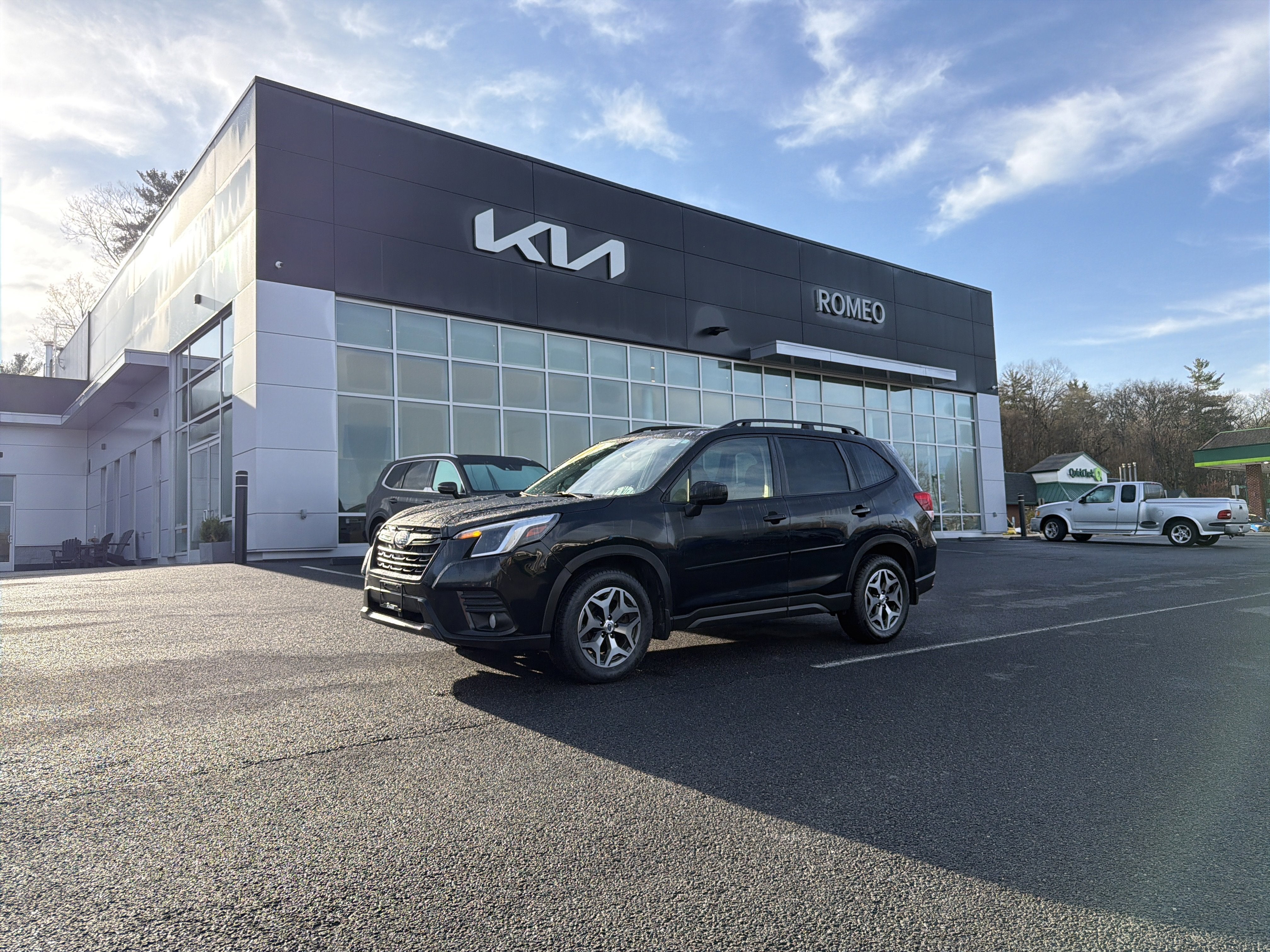 2022 Subaru Forester Premium in Crystal Black Silica — front three-quarter view